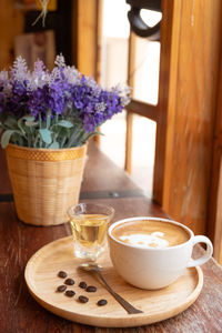 Close-up of coffee served on table