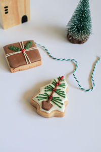 High angle view of christmas decorations on white background