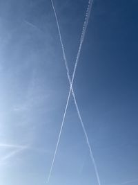 Low angle view of vapor trail in sky