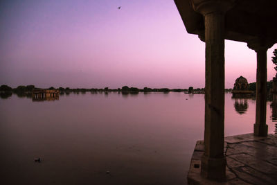Scenic view of lake against sky during sunset