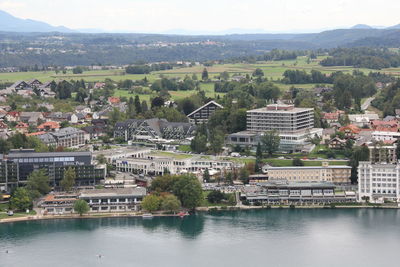 High angle view of river amidst buildings in town