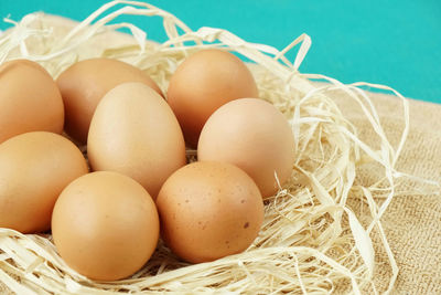 High angle view of eggs in basket