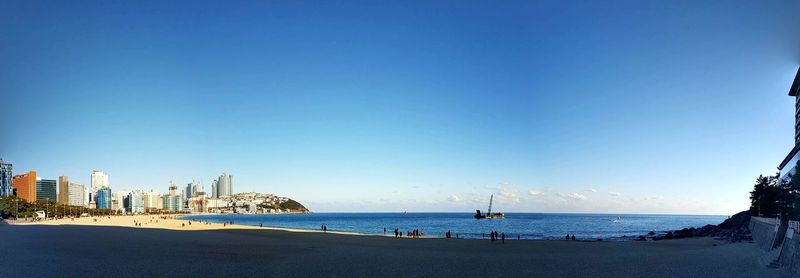 View of beach against blue sky