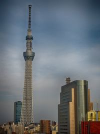 Low angle view of modern buildings against sky