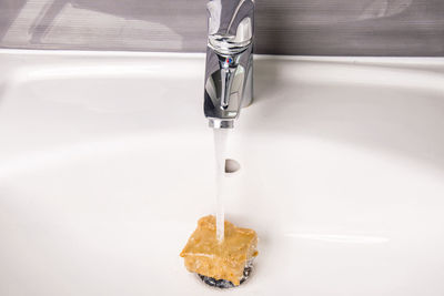 High angle view of faucet in bathroom