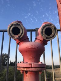 Low angle view of fire hydrant against sky