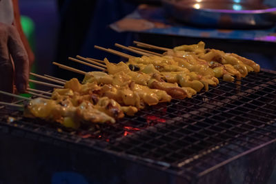 Close-up of meat on barbecue grill