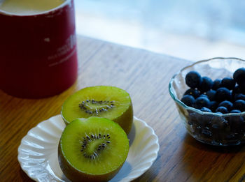 Close-up of fruits in glass on table