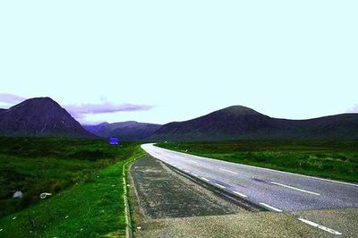 Country road passing through landscape