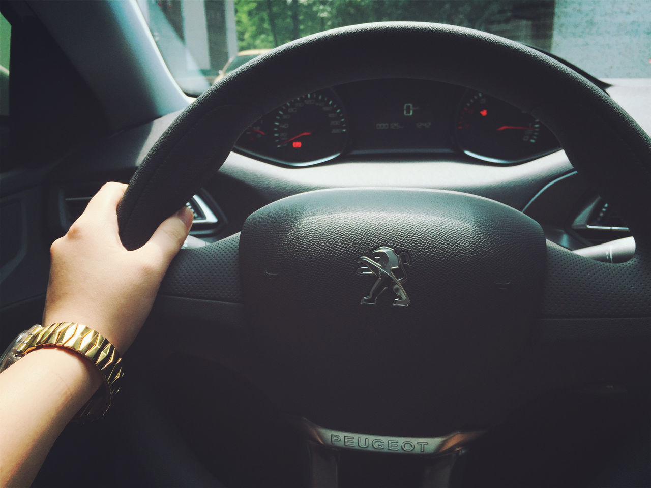 CLOSE-UP OF WOMAN HAND WITH CAR