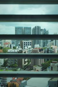 Modern cityscape against sky