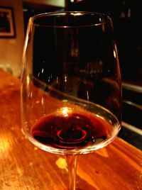 Close-up of wine glass on table