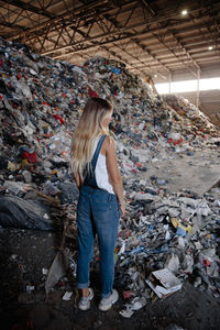 Man standing on garbage