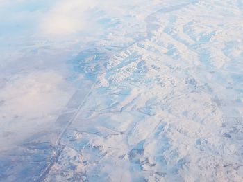Aerial view of snow covered landscape
