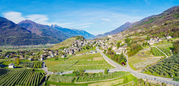 Scenic view of landscape and mountains against sky