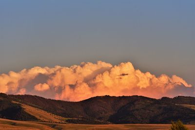 Scenic view of mountains against sky during sunset