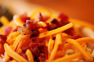 Close-up of french fries and bacon