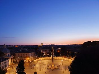 High angle view of city buildings at night