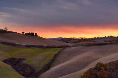 Scenic view of landscape against sky during sunset