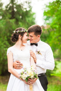 Young woman holding bouquet