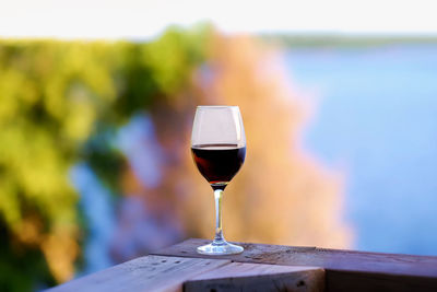 Close-up of wineglass on table