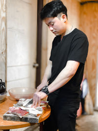 Young man preparing food