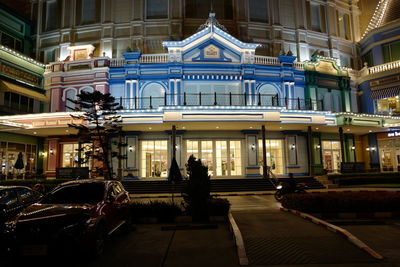 Man in front of building