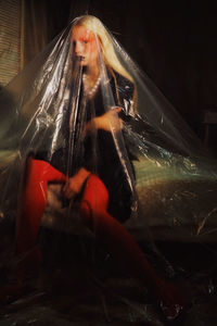 Teenage girl seen through plastic