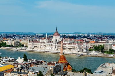 High angle view of city at riverbank