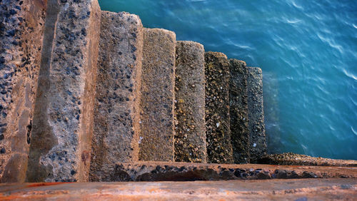 High angle view of rock on sea