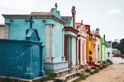 Colorful tombs in a row on cemetery in chichicastenango, guatemala