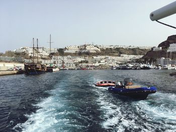 Ship in sea against clear sky