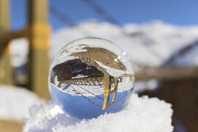 Close-up of crystal ball on ice