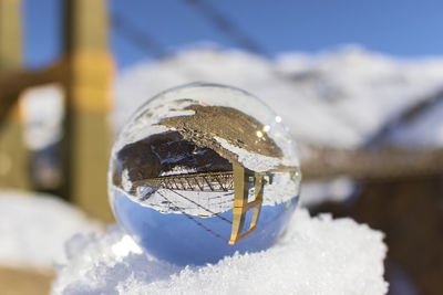 Close-up of crystal ball on ice
