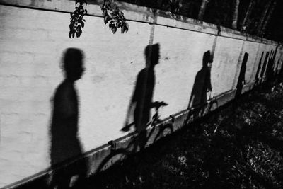 Shadow of people on wall