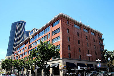 View of buildings in city against clear sky