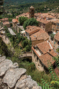 View house roofs and belfry at the village of moustiers-sainte-marie, in the french provence.