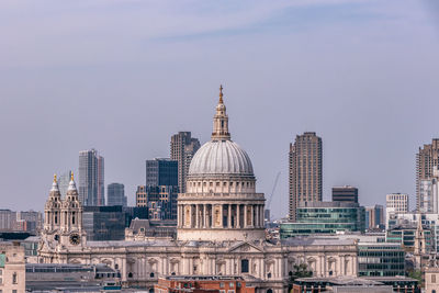 Modern buildings in city against sky