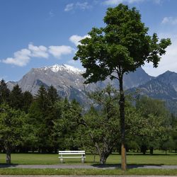 Scenic view of mountains against cloudy sky