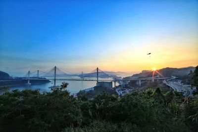 View of suspension bridge in city