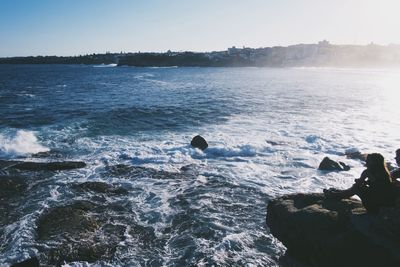 Waves splashing on rocks