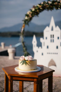 Flower on cake over table