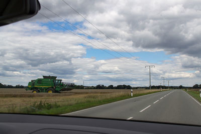 Country road passing through rural landscape