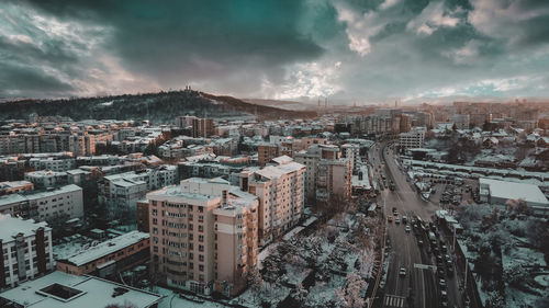 High angle view of street amidst buildings in city