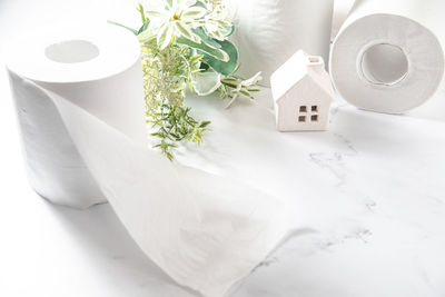 High angle view of white flower vase on table