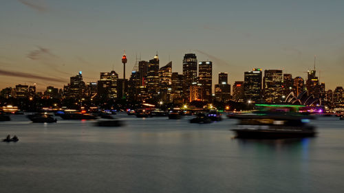 Cars moving on illuminated city at night