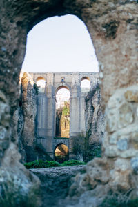 View of historical building through arch