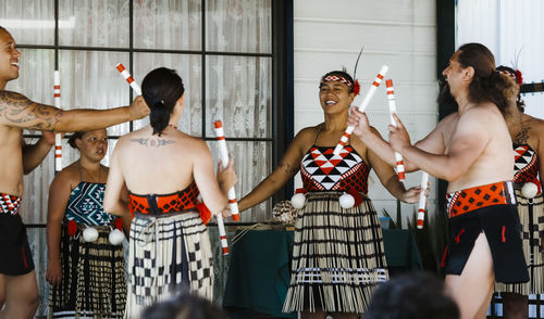 Women standing on stage