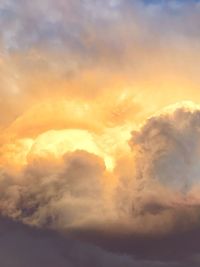 Low angle view of dramatic sky during sunset