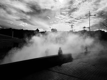 Kids playing with the fog in bilbao